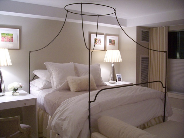 [surroundings blog white bedding with iron canopy bed.jpg]