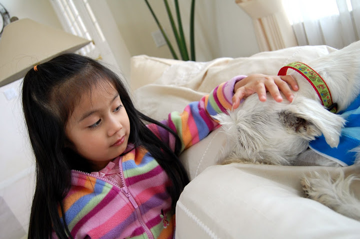 Khiara loved playing with Maui.