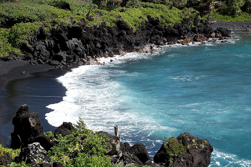 One of the many black sand beaches to play at!
