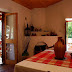 To Spitiko Toy Archonta - Seventh Photo, To Spitiko Toy Archonta - The House lies in a typical mountain village in a lovely valley in the heart of Troodos Mountain. The lodge located in the centre of Treis Elies village and its balconies and windows offer a lovely view to the valley of the village. Here you can find a friendly atmosphere and it is the perfect place for nature lovers, in serene surroundings. The house consists of three different units, two of which are apartments provided to customers, accommodating from 2 to 8 persons total. Found out more at Whole Travel, http://www.wholetravel.com/supplier/to-spitiko-toy-archonta., Cyprus Album