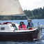 Jan and Tom sailing Whisper in Drayton Passage