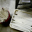 Flute bodies cut to length are stored in buckets and bins between manufacturing stages. Flute bodies cut to length are stored in buckets and bins between manufacturing stages.