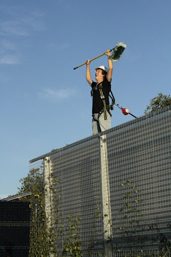 Travis is pretty happy about cleaning those solar panels.