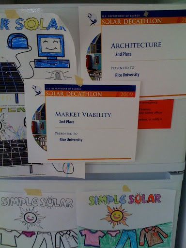 Our certificates are proudly displayed on our refridgerator, alongside our beautiful Simple Solar art.