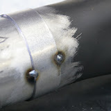 tacking the new collector to the old. I cut off a piece of the reducer to use as a joining band