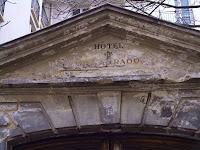 Date: December 2007</p>
<p>Location: Paris</p>
<p>Story: You get two pictures today, the first is the door, the second the inscription above the door. The hotel is long gone. There is a plaque in the wall beside this door that refers you to http://cribier.net/Hotel-Raoul/ for more information on the door. The article is in French.</p>
<p>It is not clear why the door has been almost preserved. It seems to have survived in spite of the neglect imposed upon it. A magnificent door it is. The buildings it hides date from the 1500's to the 1800's. I am also not sure why it is called an hotel, since it appears to have never fulfilled that role.