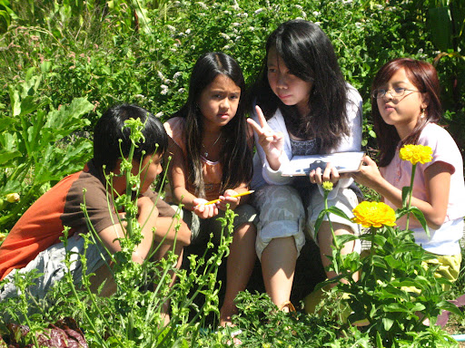 Students engage in learning outside in the New Holly P-Patch