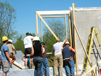 Walls up side by side. A window will sit in this wall beside the bale wall.
MVG