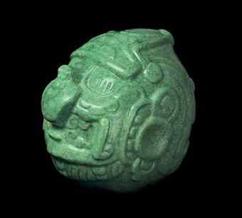 This 10-pound piece of jade found cradled in the arm of an entombed elderly man is a Belize national treasure