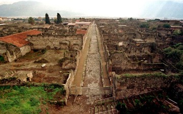 Pompeii, the ancient Roman town close to Naples was almost completely buried when nearby volcano Vesuvius erupted in 79 AD. The ruins of villas and streets are visited by millions Pompeii, the ancient Roman town close to Naples was almost completely buried when nearby volcano Vesuvius erupted in 79 AD. The ruins of villas and streets are visited by millions