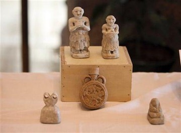 Hundreds of Iraqi artifacts looted from museums and archaeological sites across the country have been returned to Iraq | AP Photo/Karim Kadim Iraq_Artifacts