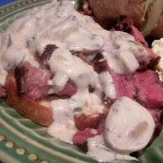 Steak Served on Parmesan Toasts With Sour Cream/Onion/Garlic Sau