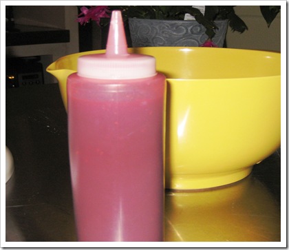 raspberry couli in bottle