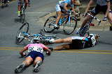 Lauren Hall (#206) of Team Vera Bradley Foundation and Rushlee Buchanan (#248) of Colavita/Baci Pro Cycling Team crash May 9, 2010, during the Sunday Criterium of the Joe Martin Stage Race in Fayetteville, Arkansas.
