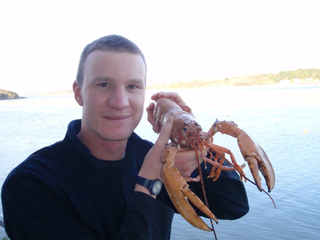 [Hatchery technician Charlie Ellis with 'Thermidor' the lobster[2].jpg]