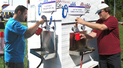 Phil and Doug pouring beer.