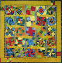 “Fat Quarter Mystery Quilt”. Skill Level : intermediate