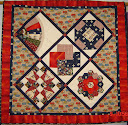 Small Beginner Sampler Quilt. Start with the basics including block drafting, hand piecing and quilting as wel as machine techniques.