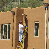 Half done - painting downspouts