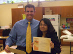 Edith Corral smiles proudly with her Glow certificate