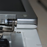 This shows the start of typical hinge problems, the plastic seperates because the hinge is loose inside.