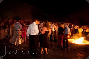 Wedding guests dancing around a fire - Joretha Taljaard Wedding Photography