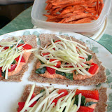 Ezekiel tortilla (we weren't all raw in 2007) topped with homemade pizza pate (from a Boutenko recipe), red bell peppers, kale, and zucchini shreds. Plus yam fries!