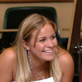 Students discuss leadership during a seminar.