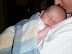 5 weeks old alseep with Mommy 2.JPG