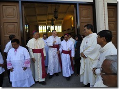 Msgr. Joseph Edwards Adams being received by Msgr. Villegas and Msgr. Mayugba