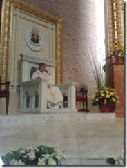 Archbishop Socrates B. Villegas, DD sitting on the Archbishop's cathedra.