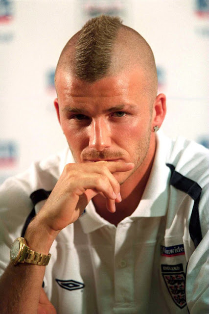 England's captain David Beckham defends criticism against his new hair style during England's press conference