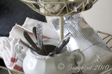 [Three tired basket with kitchen accessories.jpg]