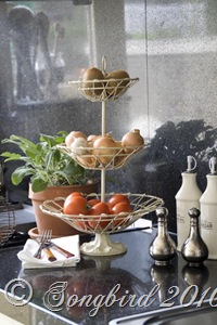 [Three tired basket with fruit.jpg]
