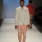 A model walks the runway at the Perry Ellis Spring 2011 fashion show during Mercedes-Benz Fashion Week at The Stage at Lincoln Center on September 13, 2010 in New York City.