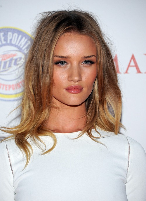 HOLLYWOOD, CA - MAY 11: Actress Rosie Huntington-Whiteley arrives at the 2011 Maxim Hot 100 Party with New Era, Miller Lite, 2(x)ist and Silver Jeans Co. held at Eden on May 11, 2011 in Hollywood, California. (Photo by Angela Weiss/Getty Images For MAXIM) *** Local Caption *** Rosie Huntington-Whiteley