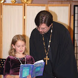 Fr. Michael e Nika cantare Carol di Natale "Ho visto tre navi" insieme
