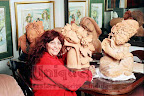 Eva Farkas-Fischhof with four sculptures in her studio