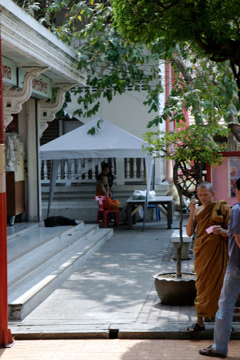 Some monks smoke and many have cell phones