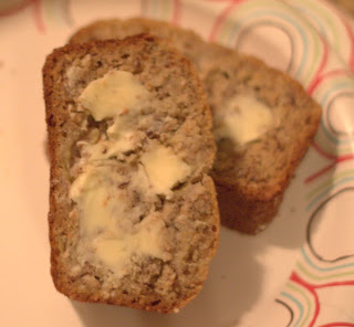 picture of yogurt-bran banana bread with butter on it