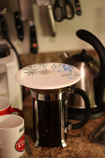 picture of french press covered with paper plate