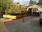 Back at my cousin Hughs house, I used the mobile home jacks to level out the two sections to square and cut the sections in preparation to be welded.