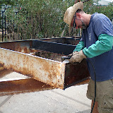 I'm using a plasma cutter to clean up all the sharp edges on the trailer.