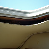 The head is missing a trim piece that holds up the ceiling bits to the hatch.