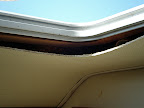 The head is missing a trim piece that holds up the ceiling bits to the hatch.