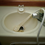 The head sink with shower wand. What a luxury.