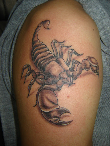 Scorpion arm tattoo