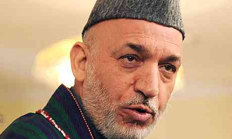 Hamid Karzai addresses a press conference