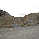 The security guards, who where great guys and obviously a bit bored, offered to take us on a tour of the mining area.  It consisted of a big, open pit mine that was flooded (no picture) and this area.  Their ore apparently yields approximately 6 ounces of gold per ton.  It apparently costs around $300 per ton to process.  That is a damn good equation.
