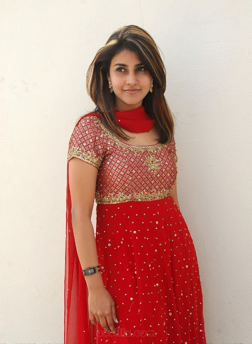 kausha rach in red dress